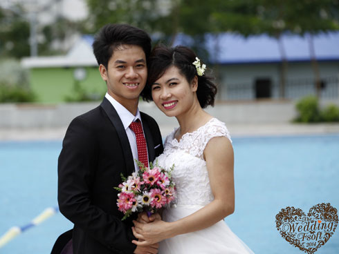 <p> Chú rể Mai Trọng Luân (FSU11) và cô dâu "kình ngư" của FSU17 Nguyễn Thị Thể.</p>