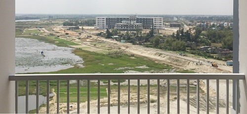 <p class="Normal"> Tòa nhà nhìn từ khu căn hộ - khách sạn FPT  Smart Nano Flat - cũng đang trong giai đoạn hoàn thiện.</p>