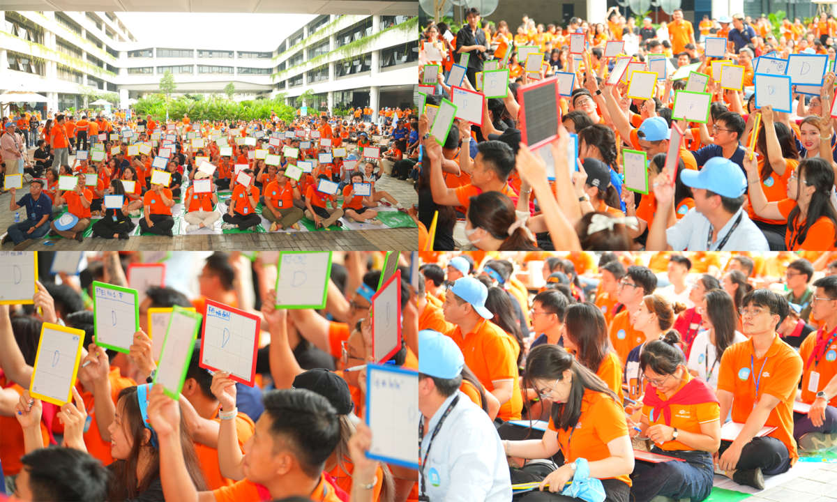 <p class="Normal" style="text-align:justify;"> Điểm nhấn của buổi chiều là khu trò chơi AI Rung chuông, nơi không chỉ CBNV mà cả lãnh đạo các CTTV cũng cùng nhập cuộc. 100 đại diện từ khắp đơn vị lần lượt ngồi vào khu vực thi, vừa tranh thủ trang trí bảng trả lời, vừa lắng nghe MC giới thiệu luật chơi. Luật thi được giữ nguyên tinh thần của “Rung chuông vàng”: người chơi theo dõi câu hỏi, viết đáp án vào bảng và đồng loạt giơ lên khi có hiệu lệnh. Chuỗi câu hỏi được thiết kế phong phú, trải rộng từ lịch sử hình thành FPT, văn hóa STCo cho tới những phong trào sống động gắn liền với đời sống người F.</p>